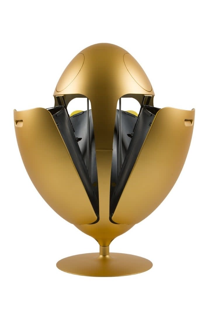 the gold egg-shaped trash can with the two separate receptacles extended outward