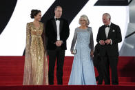 Britain's Prince Charles, from left, his wife Camilla the Duchess of Cornwall, Kate the Duchess of Cambridge and her husband Britain's Prince William pose for photographers upon arrival for the World premiere of the new film from the James Bond franchise 'No Time To Die', in London Tuesday, Sept. 28, 2021. (AP Photo/Matt Dunham)