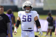 Minnesota Vikings center Garrett Bradbury (56) looks on at the NFL football team's practice facility in Eagan, Minn., Friday, Aug. 5, 2022. (AP Photo/Stacy Bengs)