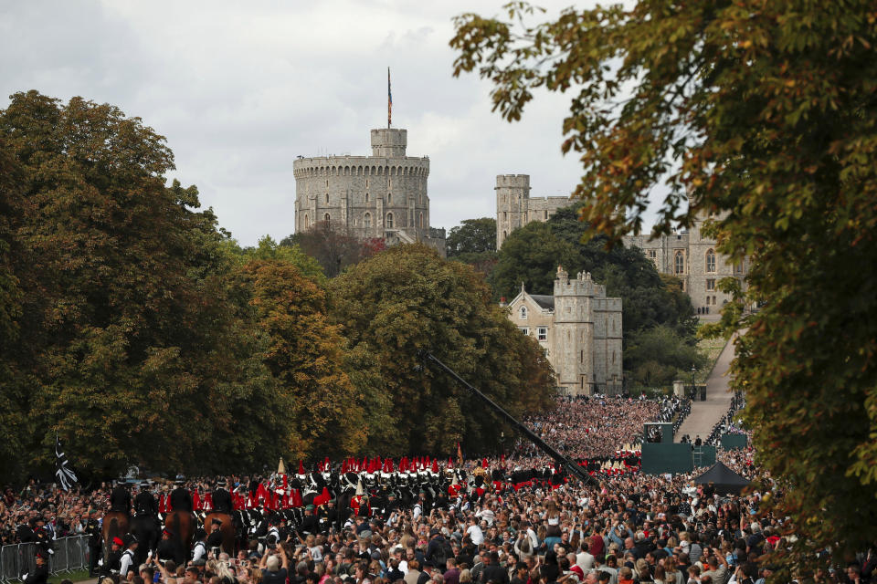 The funeral procession for Britain's Queen Elizabeth II makes its way to Windsor Castle in Windsor, England, Monday, Sept. 19, 2022. (Lee Smith/Pool Photo via AP)