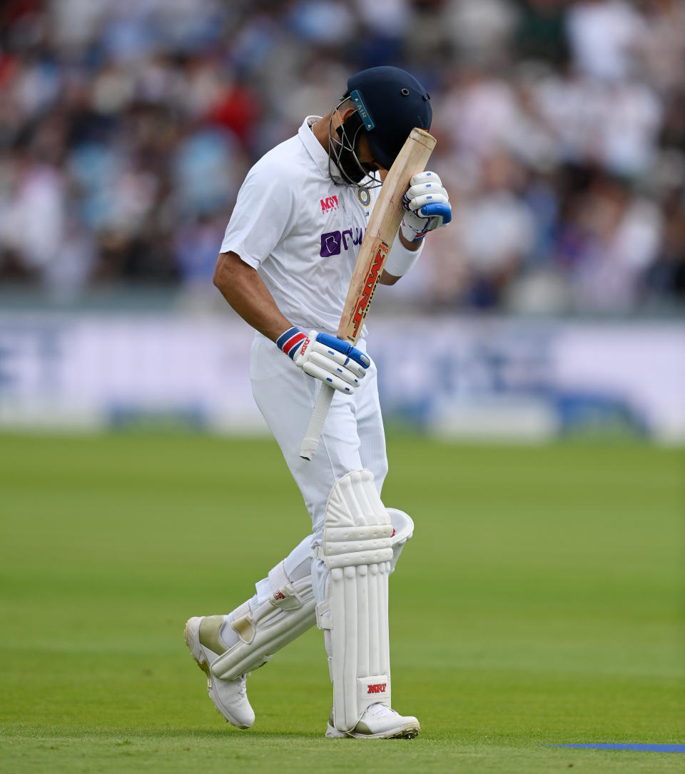LONDON, ENGLAND - AUGUST 15:  India captain Virat Kohli leaves the field after being dismissed by Sam Curran of England during day four of the Second LV= Insurance Test Match between England and India at Lord's Cricket Ground on August 15, 2021 in London, England. (Photo by Gareth Copley/Getty Images)