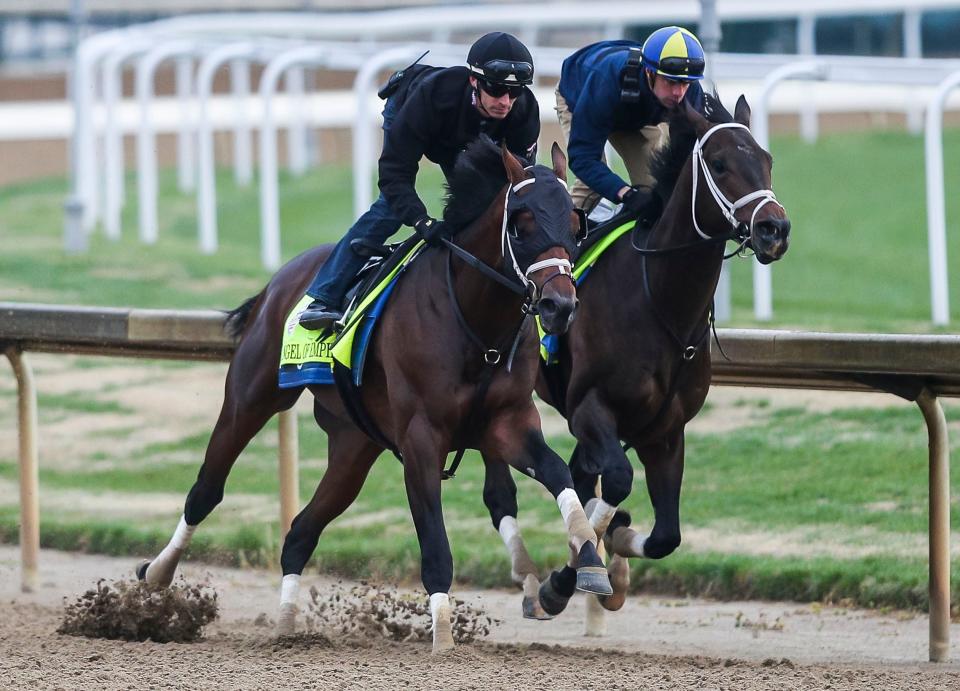 Kentucky Derby contenders Angel of Empire, on the outside, and Jace's Road, inside, breeze together at the track Saturday, April 29, 2023, the week before the Derby at Churchill Downs in Louisville, Ky. Both horses are trained by Brad Cox, who has four total contending in the Kentucky Derby May 6, 2023.