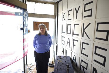 Judy Wariki, 67, a salesperson for Keysters Security locksmiths who has lived her whole life in Shamokin, poses for a picture May 1, 2014. REUTERS/Mark Makela