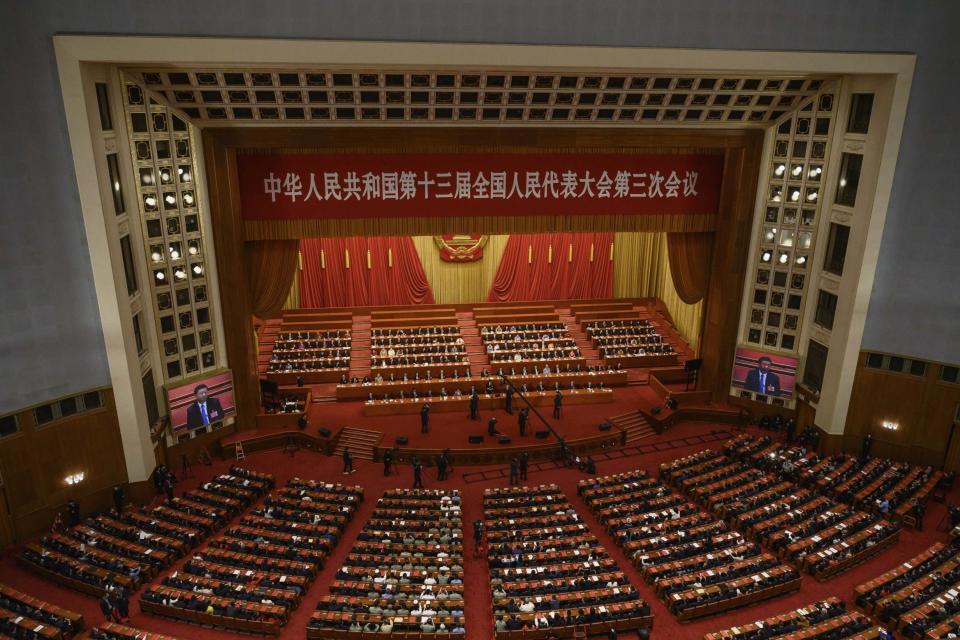 Communist Party delegates take part in a session after voting on a new draft security bill for Hong Kong (Getty Images)