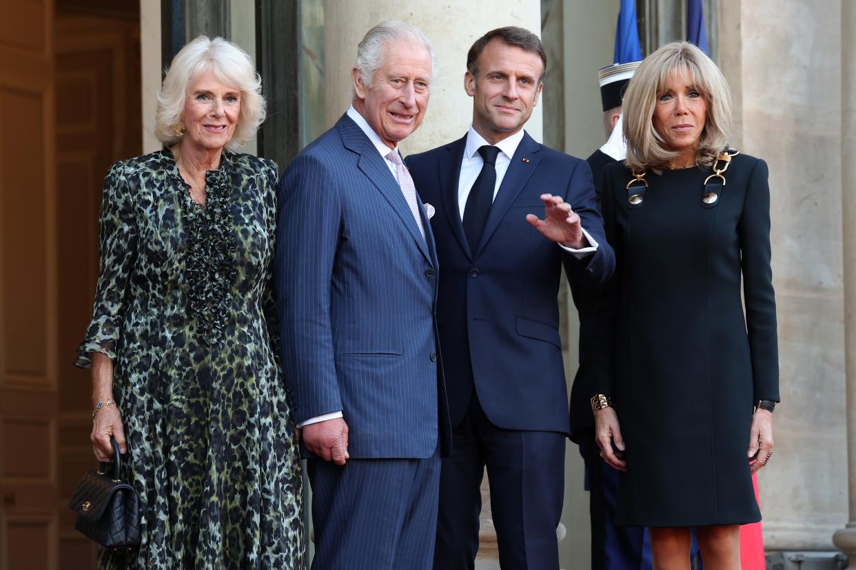 Queen Camilla, King Charles III, President Emmanuel Macron, and Brigitte Macron are seen at the Elysee Palace on Thursday in Paris (Getty Images)