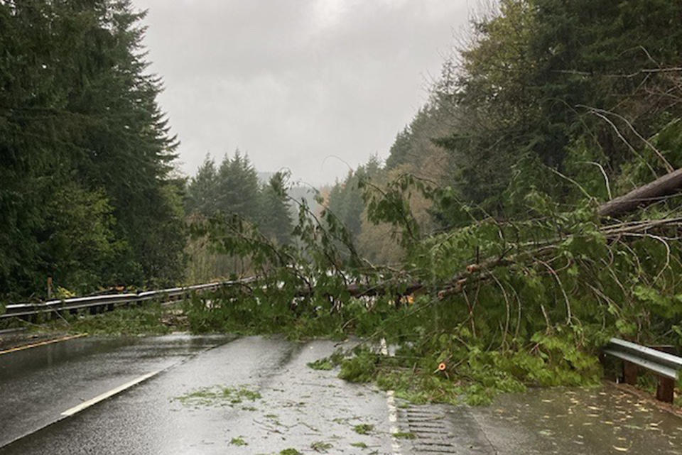 In this photo provided by the Washington State Department of Transportation, a rock and mudslide briefly closed a portion of Interstate 5 through Bellingham, Wash., on Monday, Nov. 15, 2021. There was widespread flooding in the area as storms continued in the Pacific Northwest. (Washington State Department of Transportation via AP)