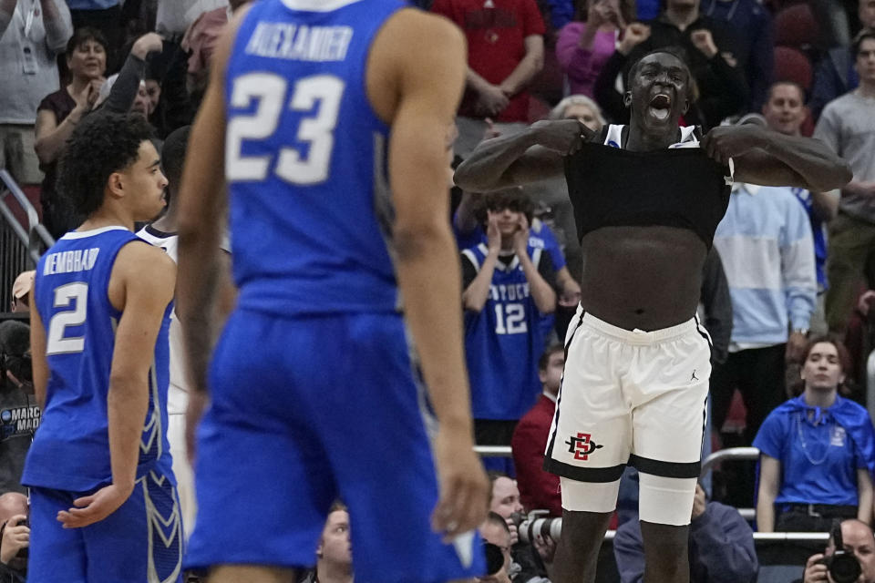 San Diego State forward Aguek Arop (33) celebrates victory against Creighton in the second half of a Elite 8 college basketball game in the South Regional of the NCAA Tournament, Sunday, March 26, 2023, in Louisville, Ky. San Diego State won 57-56.(AP Photo/John Bazemore)