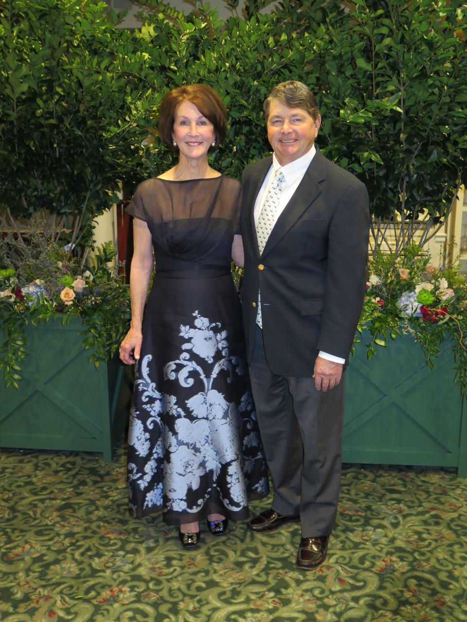 Paula Frierson with her husband His Royal Majesty: Rex LXXV Christian Basinger Frierson at the Cotillion Club President's Announcement Party at the Shreveport Club January 26, 2024.