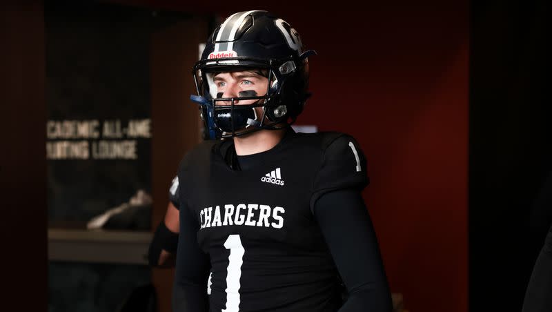 Corner Canyon quarterback Isaac Wilson prepares to face Farmington in a 6A football semifinal at Rice-Eccles Stadium in Salt Lake City on Thursday, Nov. 10, 2022. Wilson threw for a career-high 469 yards and four touchdowns in Corner Canyon’s season-opening win over Granger last week.