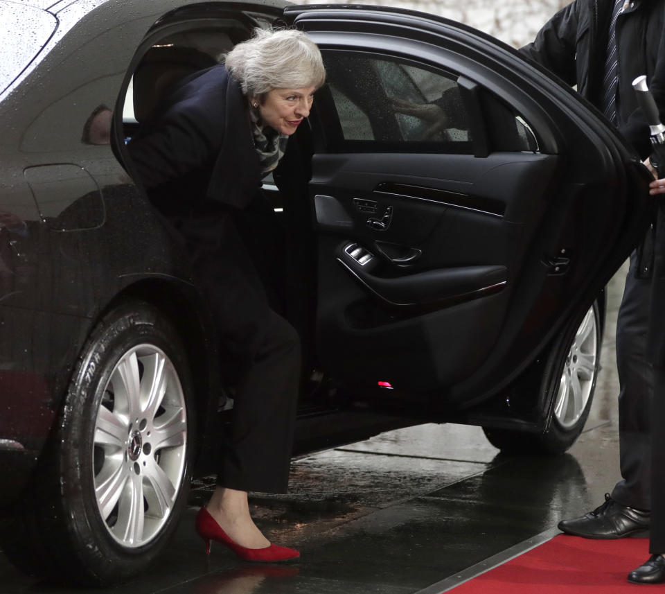 British Prime Minister Theresa May arrives for a meeting with German Chancellor Angela Merkel in the chancellery in Berlin, Germany, Tuesday, Dec. 11, 2018. May is visiting several European countries to seek "assurances" on the Brexit agreement with the European Union to aid its passage through Britain's parliament. (AP Photo/Michael Sohn)