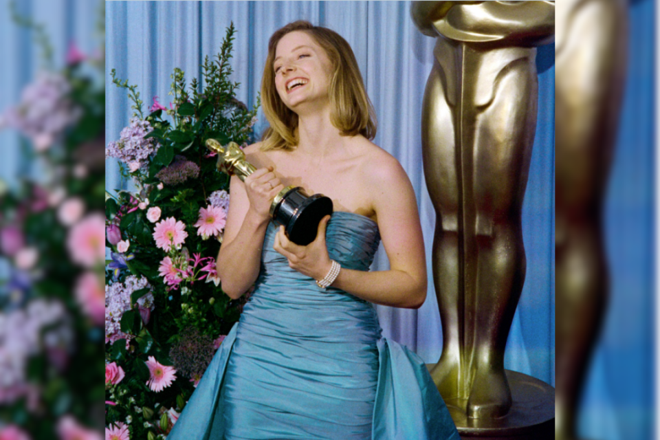 Foster held the trophy she won for her role in 'The Accused' at the 61th Annual Academy Awards. (Photo by MARK LOUNDY/AFP via Getty Images)