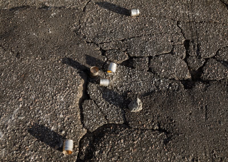 Tear gas cartridges litter the road during nationwide unrest following the death in Minneapolis police custody of George Floyd, in Raleigh