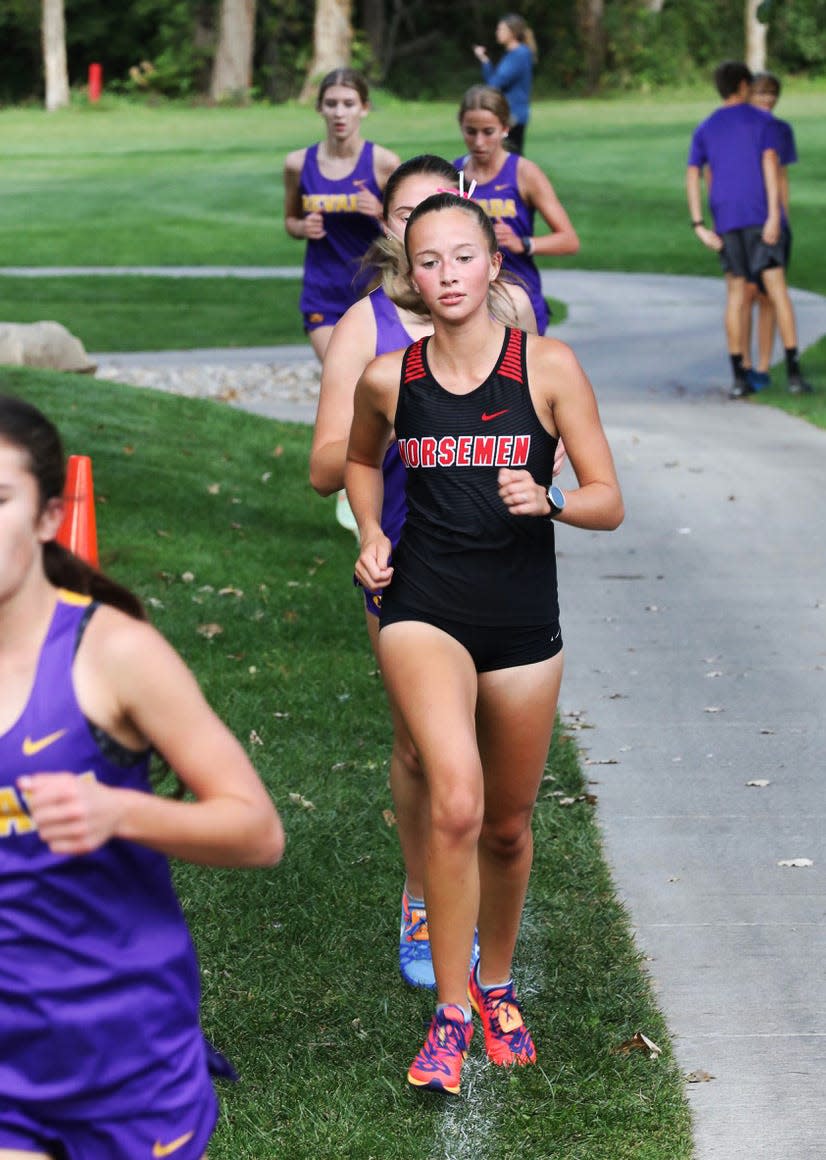 Makenna Carlson placed 10th in the varsity girls race for Roland-Story at the Norsemen Invitational Sept. 22 in Story City.