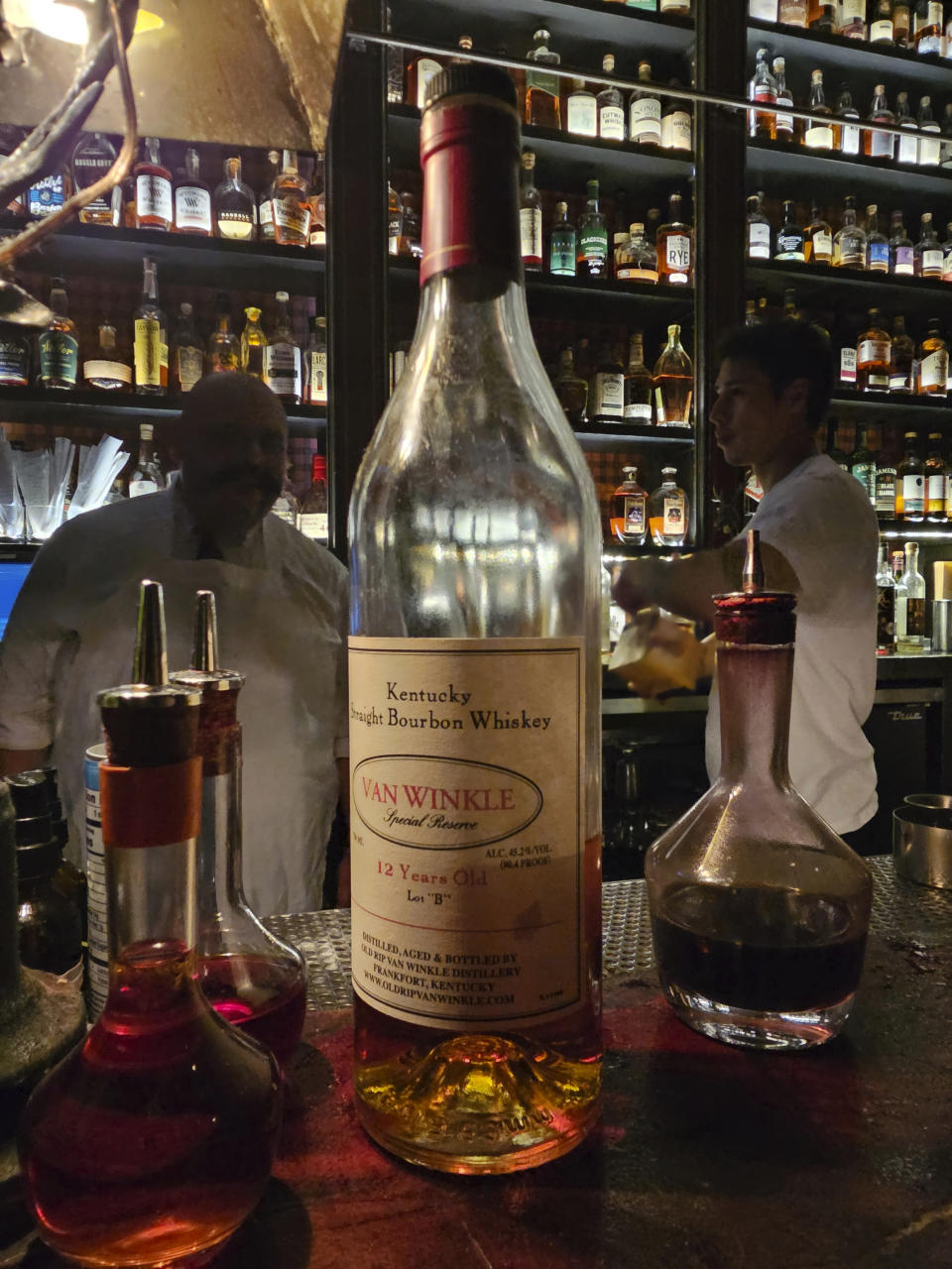 A bottle of Pappy Van Winkle,12-year-old aged bourbon is shown at Seven Grand, a whiskey bar downtown Los Angeles Saturday, March 4, 2023. Seven Grand offers an extensive selection of over 700 different whiskies from around the world, including rare and hard-to-find bottles. (AP Photo/Damian Dovarganes)