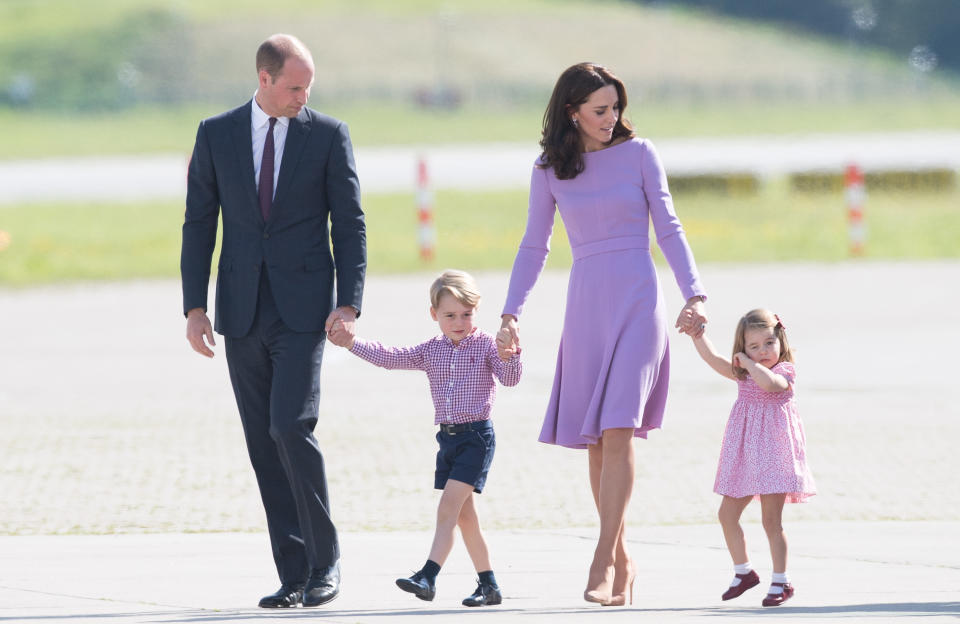 HAMBURG, GERMANY - JULY 21:   Prince William, Duke of Cambridge, Prince George, Princess Charlotte of Cambridge and Catherine, Duchess of Cambridge view helicopter models H145 and H135 before departing from Hamburg airport on the last day of their official visit to Poland and Germany on July 21, 2017 in Hamburg, Germany. (Photo by Samir Hussein/WireImage)