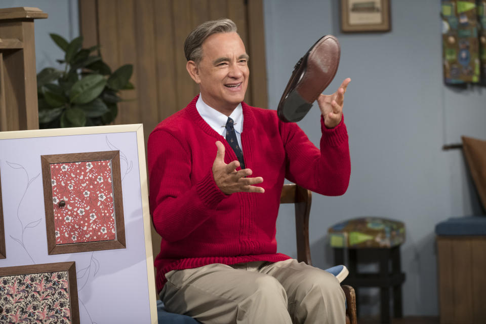 This image released by Sony Pictures shows Tom Hanks as Mister Rogers in a scene from "A Beautiful Day In the Neighborhood," in theaters on Nov. 22. (Lacey Terrell/Sony-Tristar Pictures via AP)