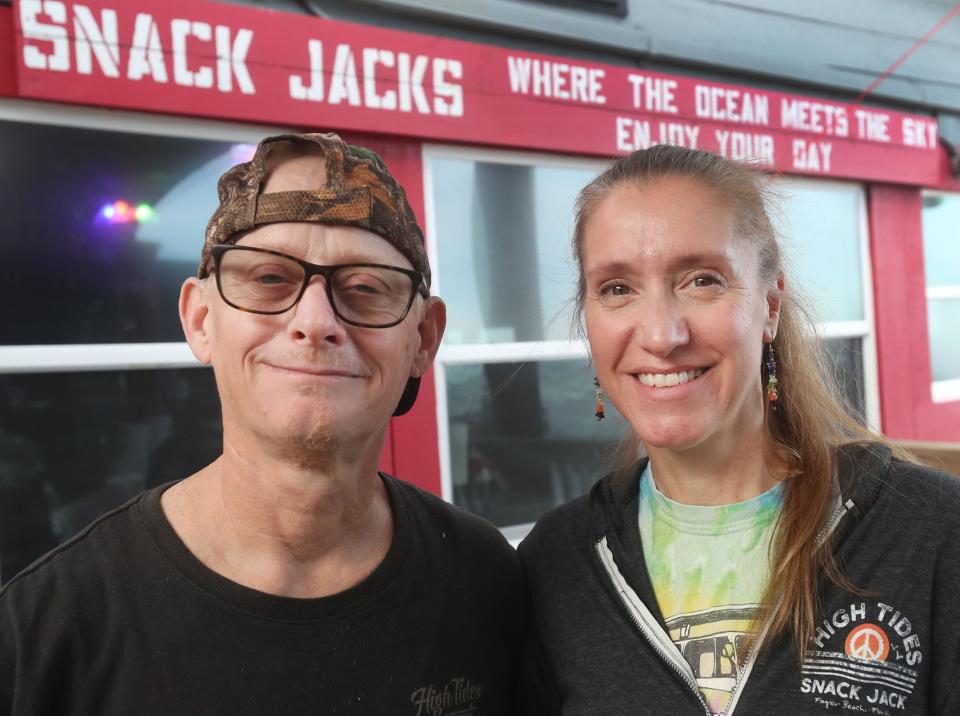 Two of the many longtime employees at High Tides at Snack Jack are kitchen manager "Red Dog" and front-of-house manager Jennifer Mancuso. Both have worked at the restaurant for more than 20 years. Mancuso, who was pregnant with her son when she started 27 years ago, now works with him occasionally at the restaurant, she said. "There's never a bad day at work," she said.