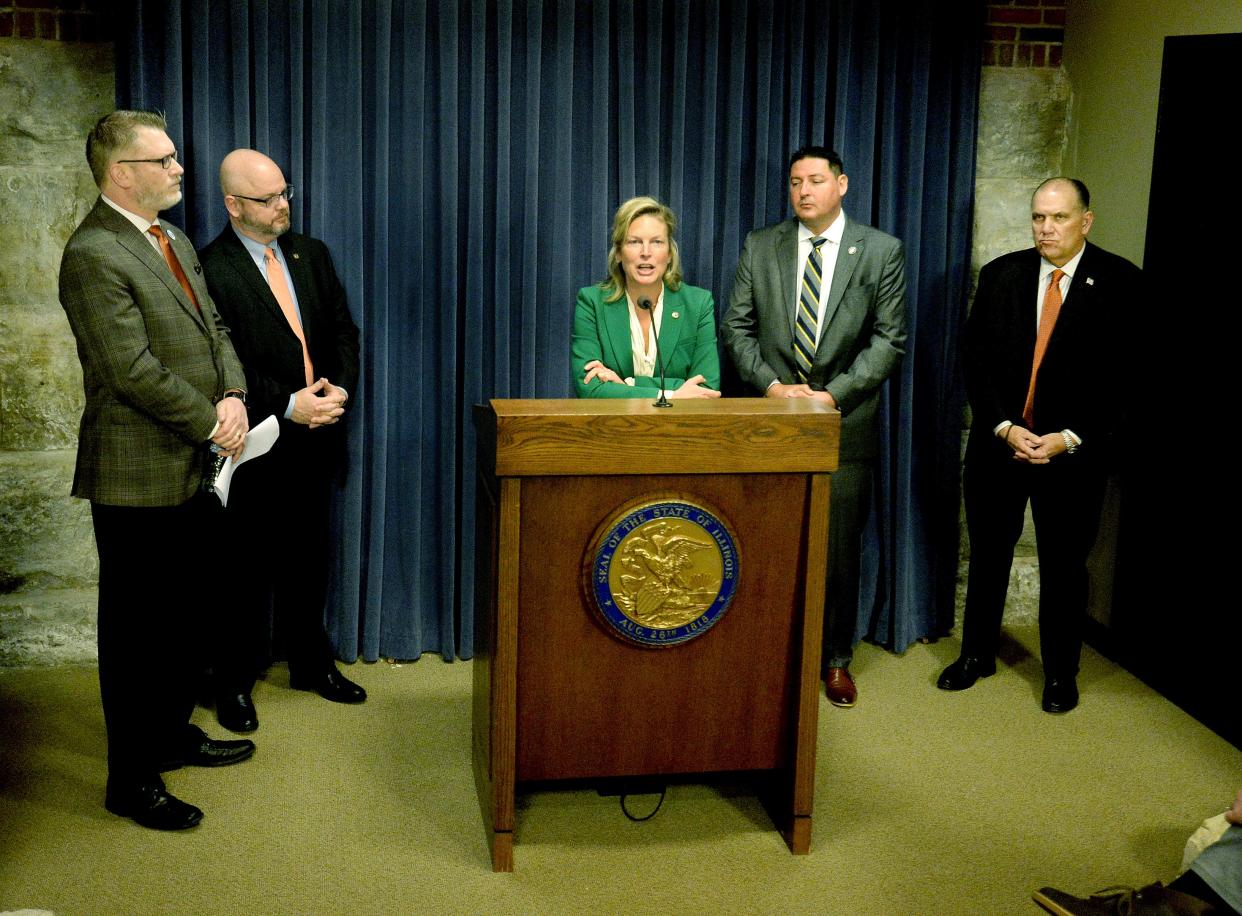 House Republican Leader Tony McCombie R- Savanna, center, with other House Republicans talks about legislative action to help combat the opioid crisis during a press conference at the state Capitol Thursday, March 16, 2023.