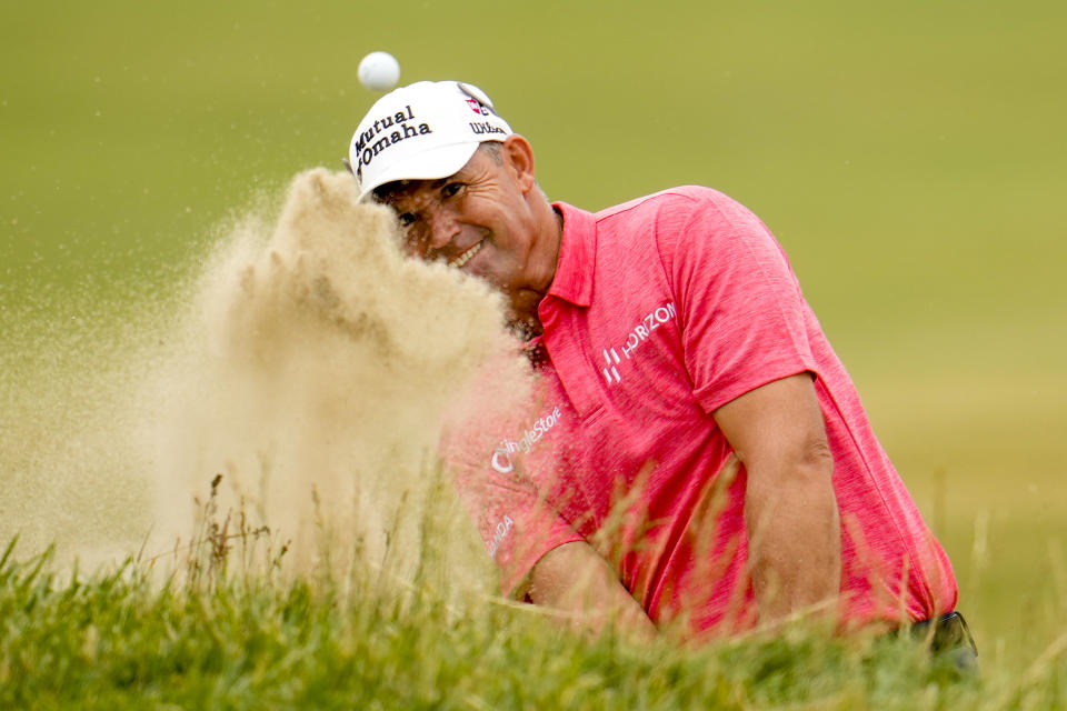 Padraig Harrington hits from the bunker on the first hole during the final round of the U.S. Open golf tournament at Los Angeles Country Club on Sunday, June 18, 2023, in Los Angeles. (AP Photo/Marcio J. Sanchez)