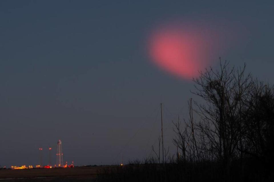 A three-stage suborbital sounding rocket launched March 3 off the East Coast is credited with creating this odd pink cloud. NASA Wallops photo