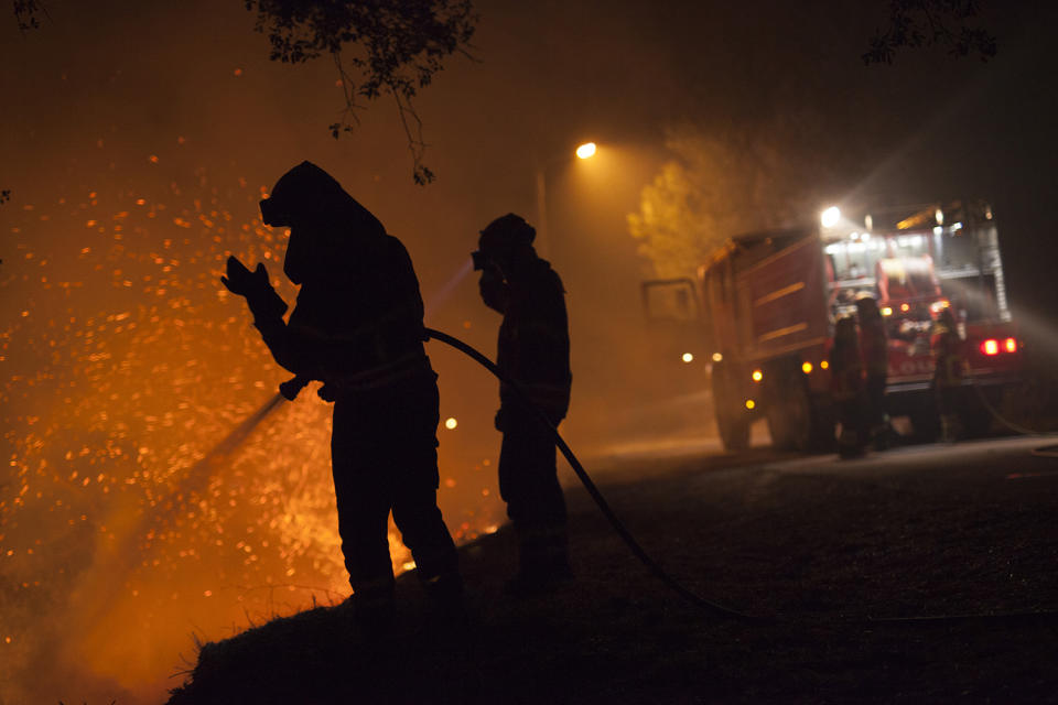 Wildfires burn out of control in Portugal and Spain