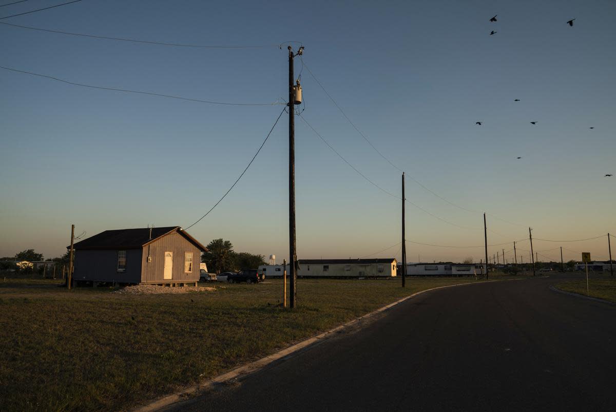 A colonia, unincorporated neighborhoods that lack basic services such as street lights, proper drainage, paved roads or waste management, is seen near Edinburg on March 25, 2020.