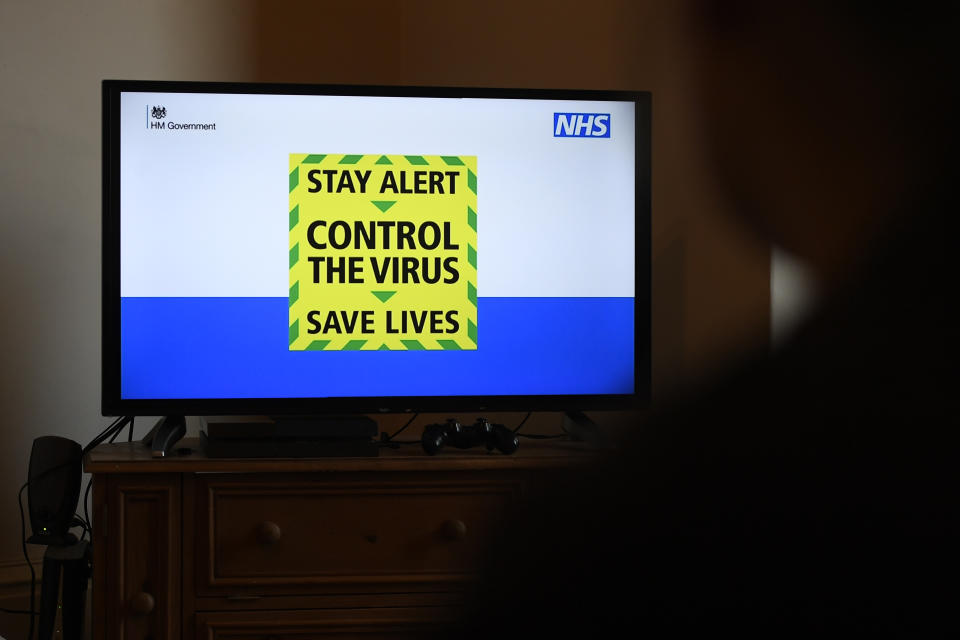 BRADFORD, ENGLAND  - MAY 10: The government's new slogan "Stay Alert, Control the Virus, Save Lives" is seen during Britain's Prime Minister Boris Johnson's televised message to the nation on May 10, 2020 in Bradford, England. The UK is continuing with quarantine measures intended to curb the spread of Covid-19, but as the infection rate is falling government officials are discussing the terms under which it would ease the lockdown. (Photo by George Wood/Getty Images)