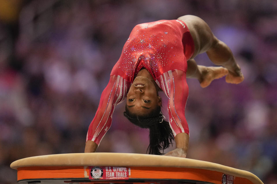 Simone Biles competes on the vault during the women's U.S. Olympic Gymnastics Trials Sunday, June 27, 2021, in St. Louis. (AP Photo/Jeff Roberson)