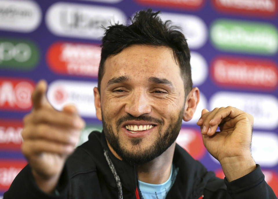 Afghanistan captain Gulbadin Naib speaks during a press conference at Old Trafford, Manchester, England, Monday June 17, 2019. (Nigel French/PA via AP)