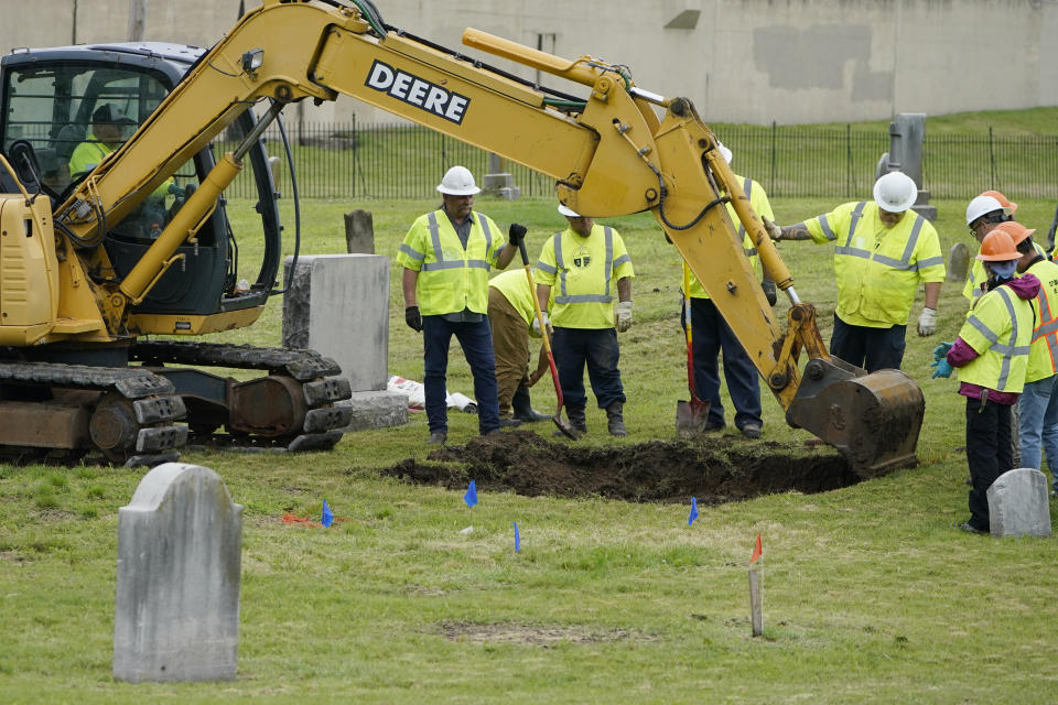 Excavation begins anew at Oaklawn Cemetery in a search for victims of the Tulsa race massacre believed to be buried in a mass grave, Tuesday, June 1, 2021, in Tulsa, Okla. (AP Photo/Sue Ogrocki)