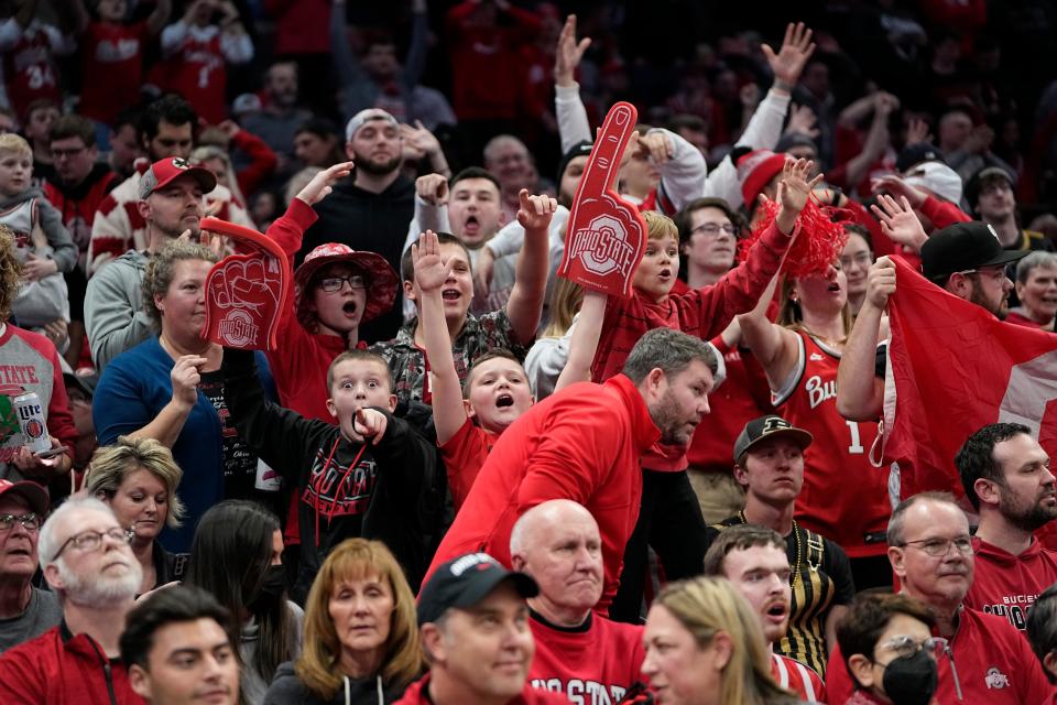 Jan 5, 2023; Columbus, OH, USA;  Ohio State Buckeyes fans cheer during the second half of the NCAA men's basketball game against the Purdue Boilermakers at Value City Arena. Purdue won 71-69. Mandatory Credit: Adam Cairns-The Columbus Dispatch