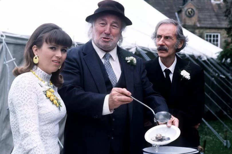 Greengrass with Gina ( Tricia Penrose) and chum Bernie Scripps (Peter Benson)