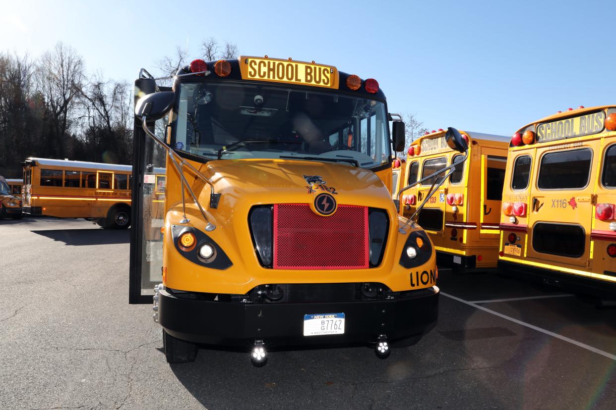 An electric school bus is parked at a depot in Sleepy Hollow, N.Y.