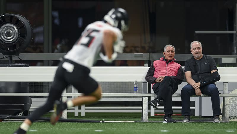 Atlanta Falcons owner Arthur Blank, left, and EVP, Chief Brand and Communications Officer Brett Jewkes watch from the sidelines during practice at Mercedes-Benz Stadium in Atlanta, Georgia, on Tuesday, June 13, 2023. 