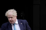 FILE - British Prime Minister Boris Johnson leaves 10 Downing Street to attend the weekly Prime Minister's Questions at the Houses of Parliament, in London, Wednesday, March 9, 2022. Johnson was dealt a major blow Tuesday, July 5, 2022 when two of his most senior Cabinet ministers quit, saying they had lost confidence in Johnson’s leadership. (AP Photo/Matt Dunham, File)