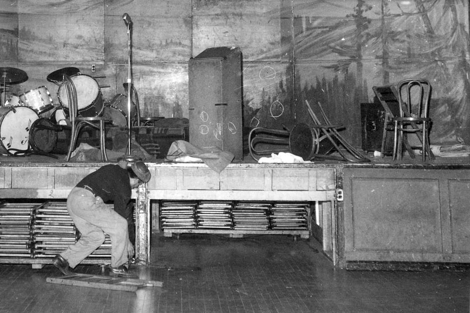 FILE — This photo shows the Audubon Ballroom, in New York's Harlem neighborhood, following the assassination of Malcolm X, Feb. 21,1965. Two men convicted in the assassination of Malcolm X are set to be cleared after more than half a century, with prosecutors now saying authorities withheld evidence in the civil rights leader's killing, according to a news report Wednesday, Nov. 17, 2021. (AP Photo/Al Burleigh, File)