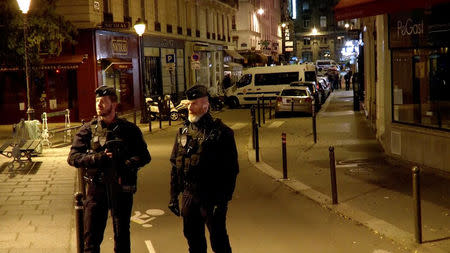 Police guard the scene of a knife attack in Paris, France May 12, 2018 in this still image obtained from a video. REUTERS/Reuters TV