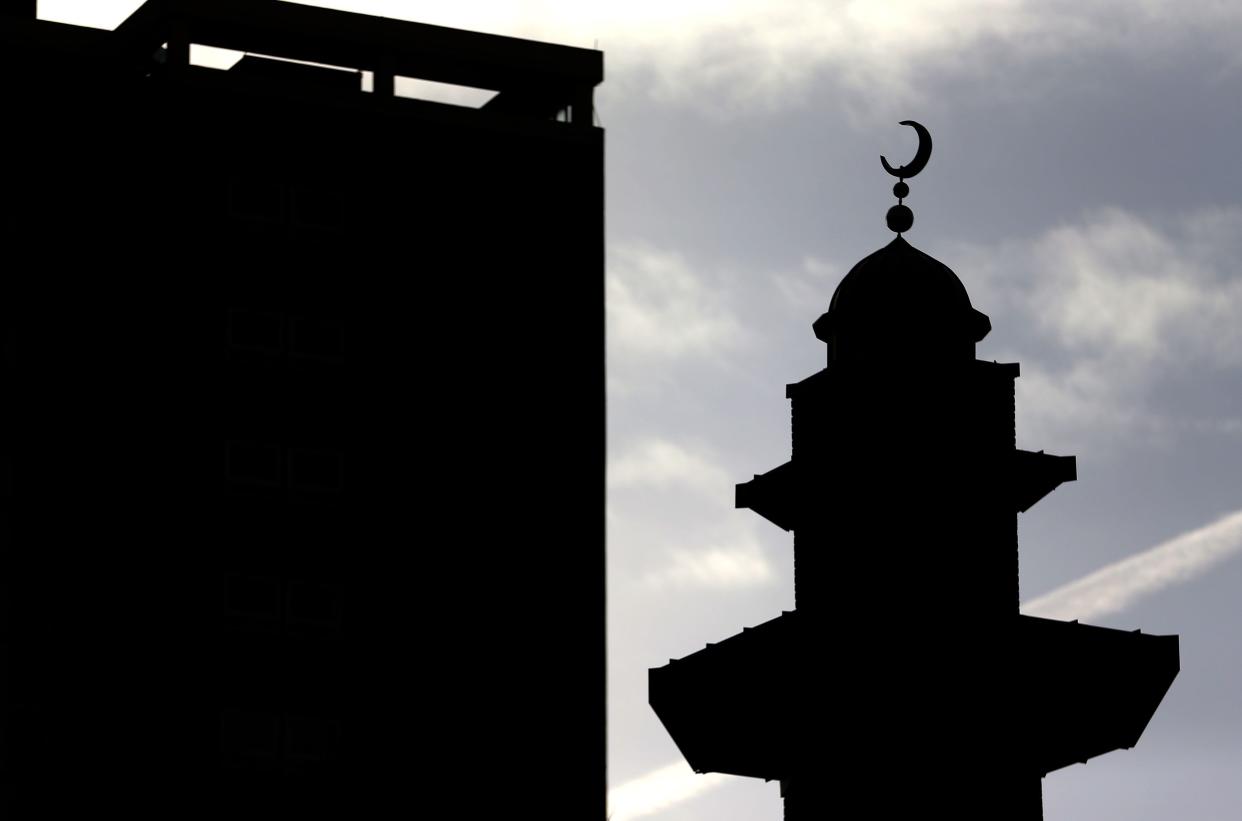 A general view a Mosque in Rochdale which stands alongside high rise flats in the town, as a review after nine Asian men were convicted of the systematic grooming and sexual abuse of white girls in Heywood and Rochdale in 2008 and 2009 has been published.