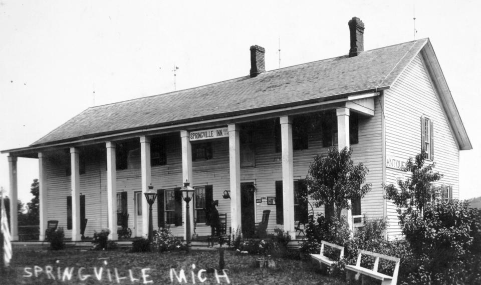 The Daily Telegram of June 4, 1927, declared the Springville Inn as a “striking example of early Michigan architecture, with its tall white pillars.”