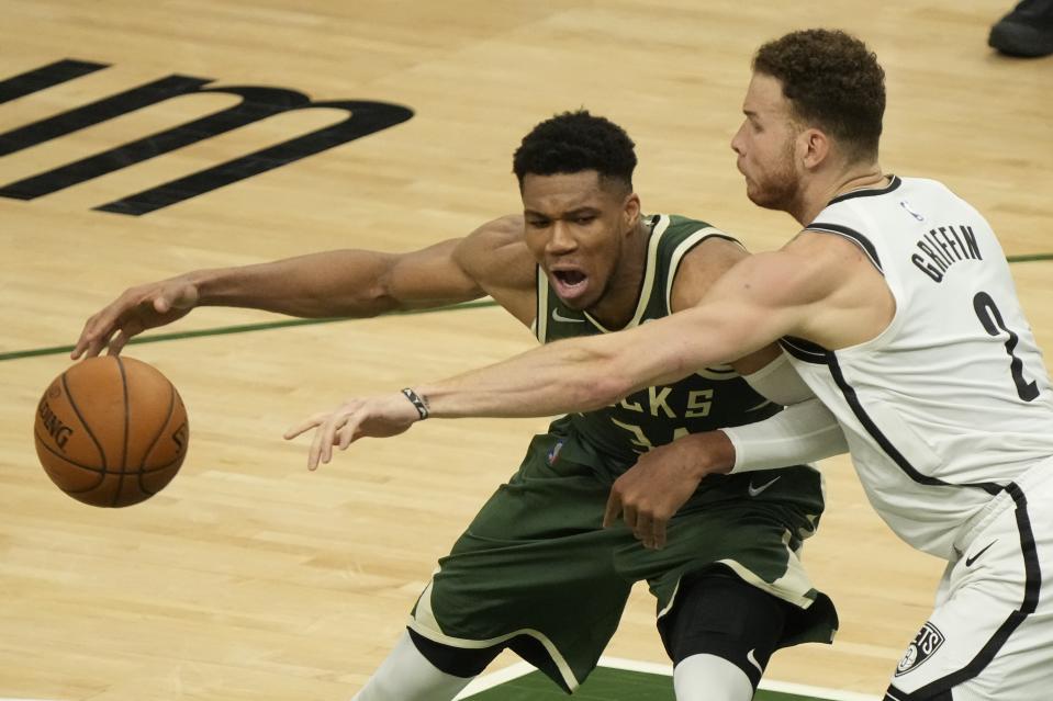 Milwaukee Bucks' Giannis Antetokounmpo tries to get past Brooklyn Nets' Blake Griffin during the first half of Game 3 of the NBA Eastern Conference basketball semifinals game Thursday, June 10, 2021, in Milwaukee. (AP Photo/Morry Gash)