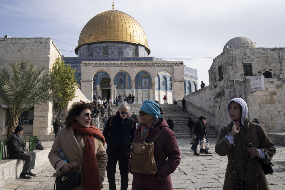 Visitors tour the Al-Aqsa Mosque compound, known to Muslims as the Noble Sanctuary and to Jews as the Temple Mount, in the Old City of Jerusalem, Tuesday, Jan. 3, 2023. Itamar Ben-Gvir, an ultranationalist Israeli Cabinet minister, visited the flashpoint Jerusalem holy site Tuesday for the first time since taking office in Prime Minister Benjamin Netanyahu's new far-right government last week. The visit is seen by Palestinians as a provocation. (AP Photo/Maya Alleruzzo)