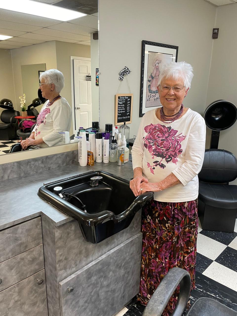 After more than 65 years on the job, Martha Neskaug knows her way around her salon work station. Knoxville, Tennessee, 2024