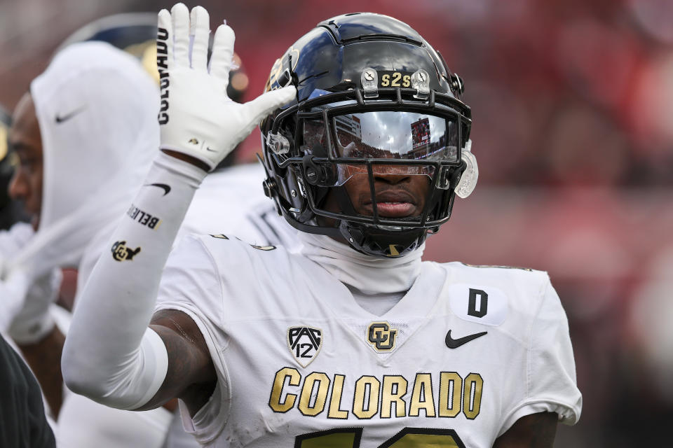 Colorado cornerback Travis Hunter reacts to a play against Utah during the first quarter of an NCAA college football game Saturday, Nov. 25, 2023, in Salt Lake City. (AP Photo/Rob Gray)