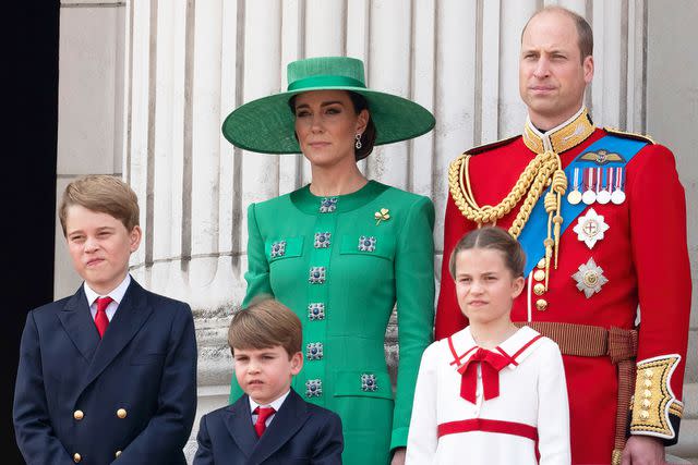 <p>Mark Cuthbert/UK Press via Getty</p> Prince George, Kate Middleton, Prince Louis, Prince William and Princess Charlotte on the balcony of Buckingham Palace during Trooping the Colour on June 17, 2023.