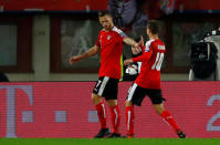 Soccer Football - 2018 World Cup Qualifications - Europe - Austria vs Serbia - Ernst Happel Stadion, Vienna, Austria - October 6, 2017 Austria’s Marko Arnautovic celebrates scoring their second goal with teammates REUTERS/Leonhard Foeger