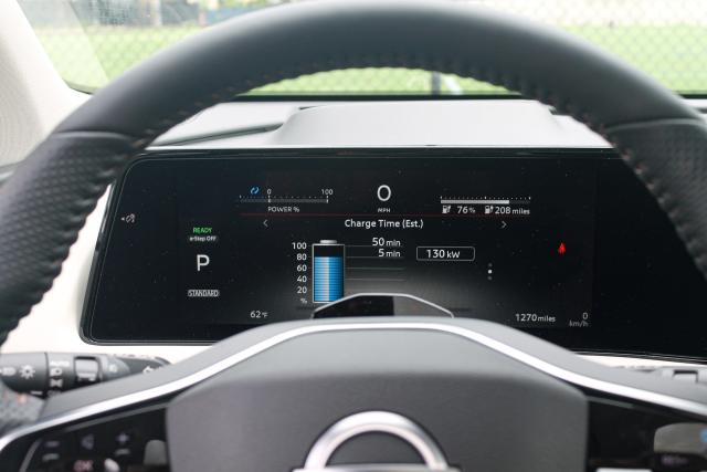 The digital gauge cluster of the 2023 Nissan Ariya Empower+ SUV.