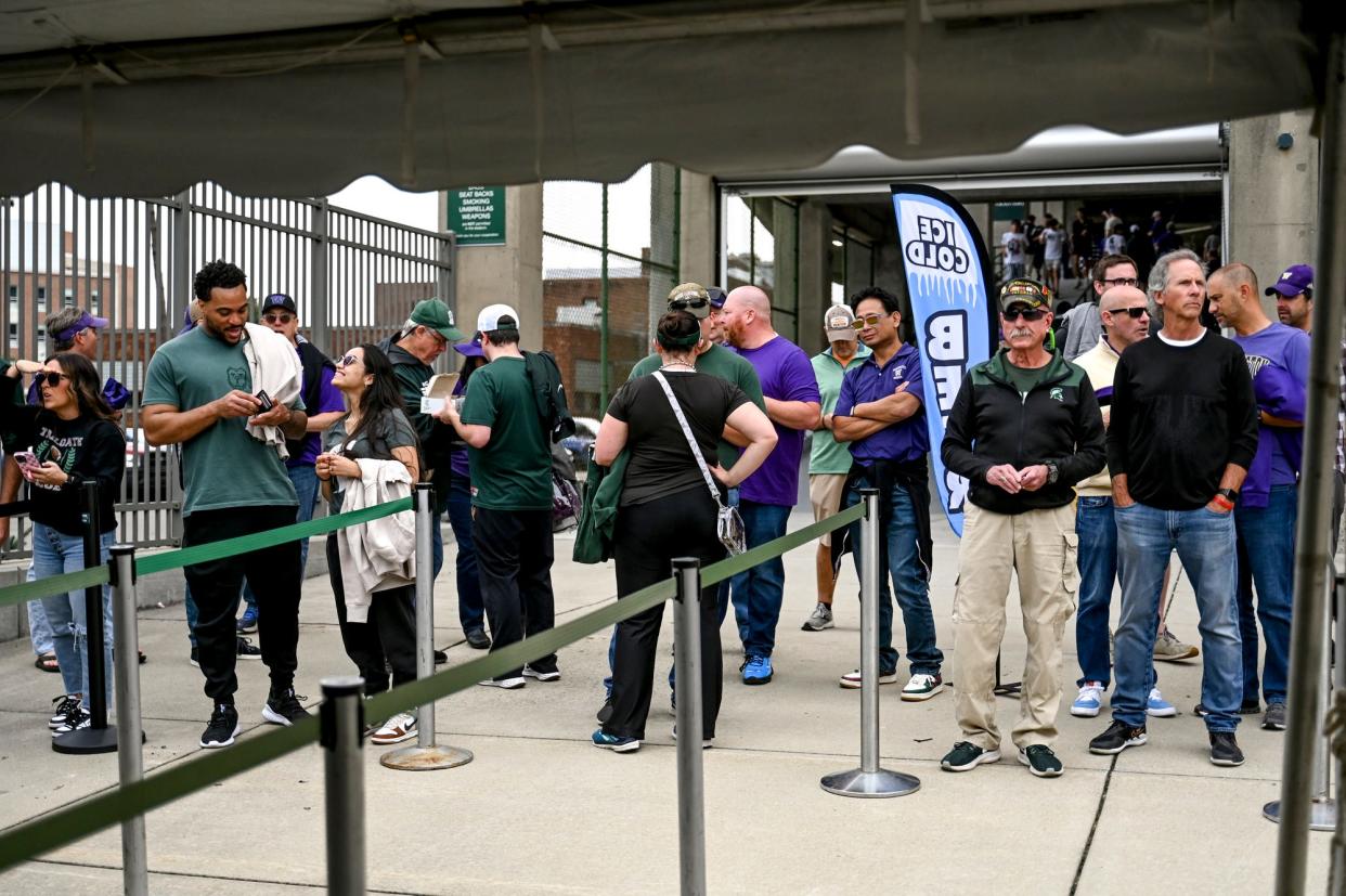 People wait in line to purchase beer before Michigan State's football game against Washington on Saturday, Sept. 16, 2023, at Spartan Stadium in East Lansing.