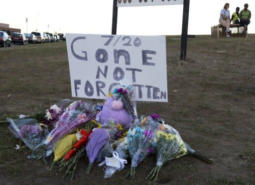 A memorial near the cinema in Aurora, Colorado, where 12 people were killed on July 20. A graduate student who told police he was the Joker opened fire in a theater showing the premiere of the latest Batman movie