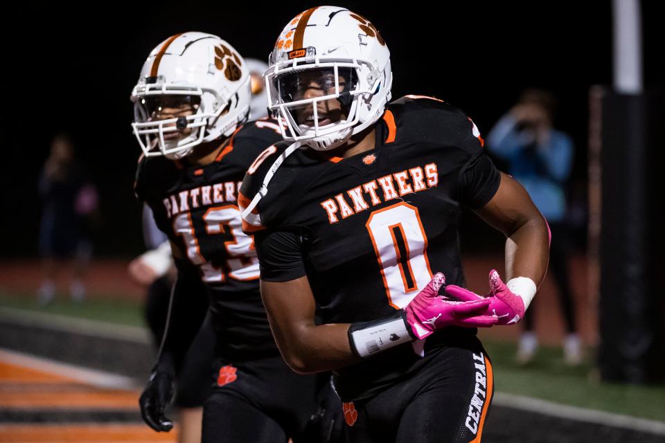 Central York running back Juelz Goff (0) rocks the baby following his second touchdown run in the first half of a YAIAA Division I football game against York High at Panthers Stadium Oct. 27, 2023, in Springettsbury Township. The Panthers won, 37-6.