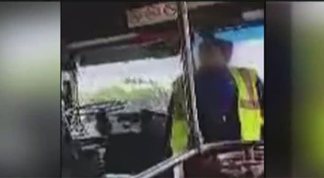 A bus driver in Houston, Texas, is under investigation for allegedly waving a switch-blade around and threatening commuters. Picture: YouTube